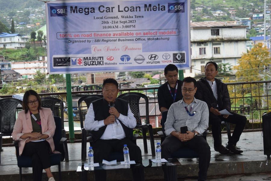 Regional Manager, SBI, RBO, Mokokchung Lokho Peter speaking at the launching programme of the two-day mega car loan mela in Wokha town on September 20 and 21. (DIPR Photo)